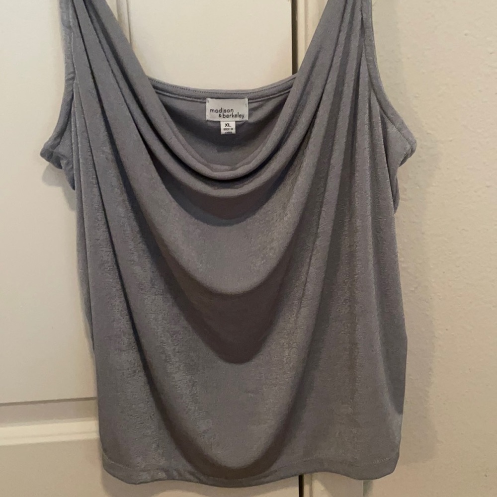 Silver scoop neck top. XL but fits like a small